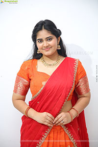 Milky Madhu stills in Orange Half Saree, HD Gallery