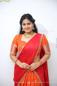 Milky Madhu stills in Orange Half Saree, HD Gallery