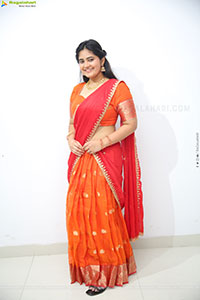 Milky Madhu stills in Orange Half Saree, HD Gallery