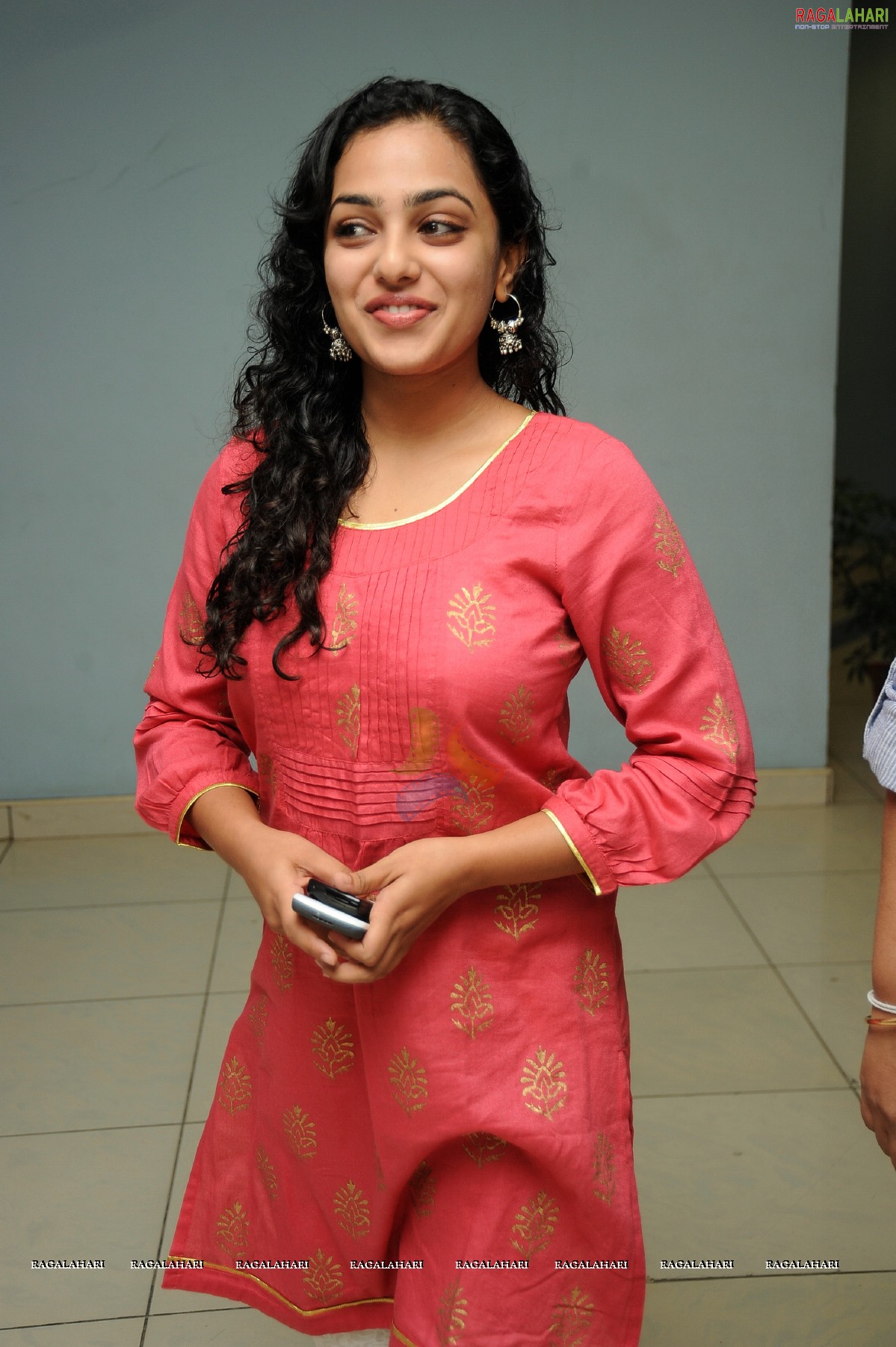 Nithya Menon at 180 Movie Audio Release - HD Gallery, Images