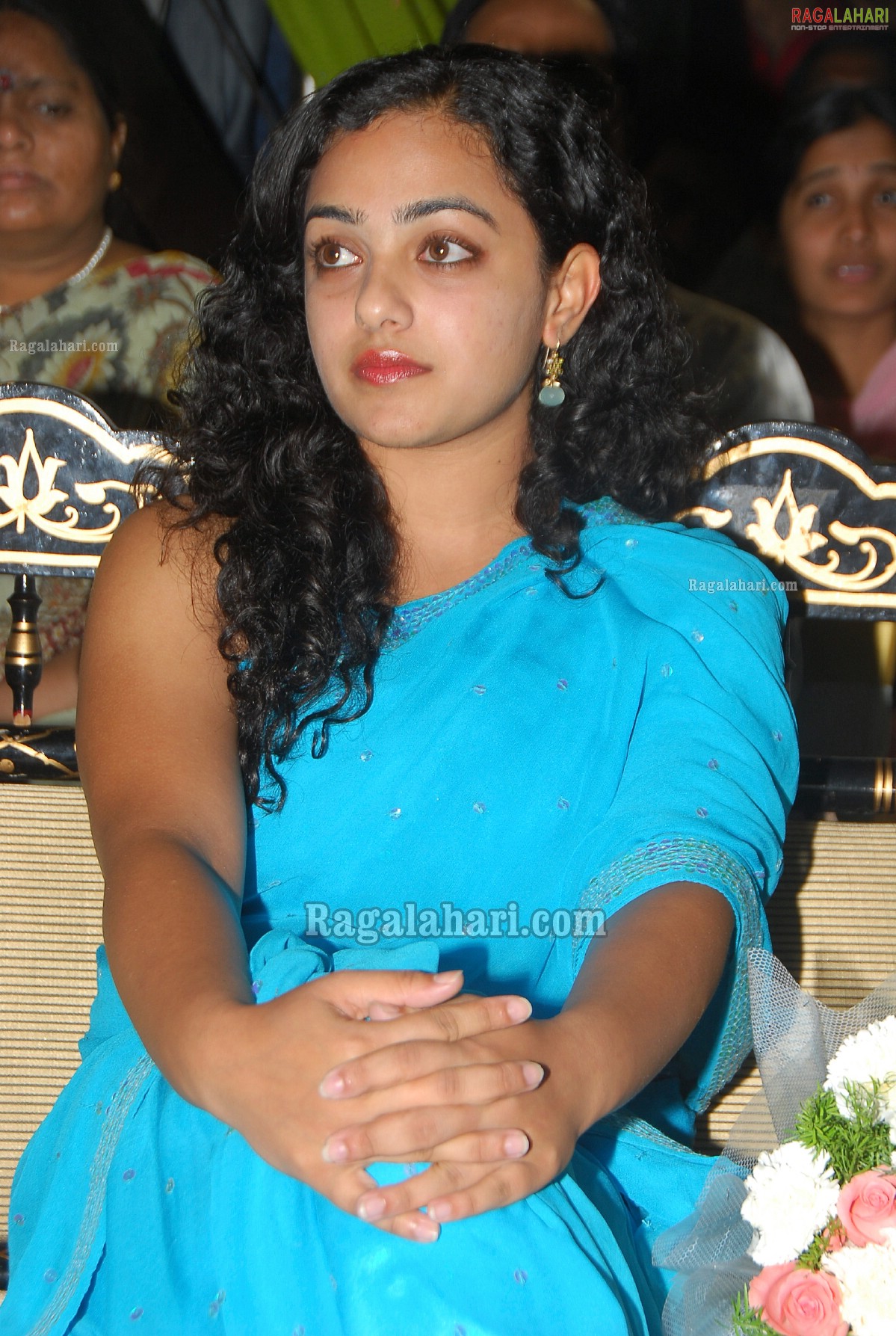 Nithya Menon at TMC DC Gold Hungama - HD Gallery, Images