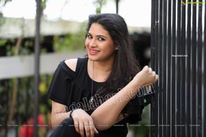 Megnna Kumar in Black Mini Dress