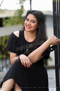 Megnna Kumar in Black Mini Dress