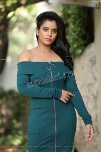 Sameera Reddy G in Teal Blue Off Shoulder Dress