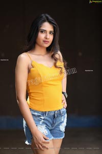 Simar Singh in Yellow Spaghetti Strap Crop Top