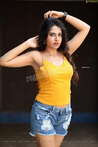 Simar Singh in Yellow Spaghetti Strap Crop Top