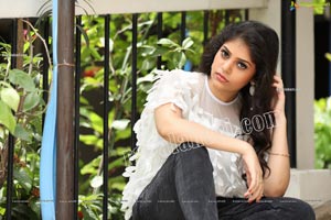 Viswa Sri Bandhavi in White Net Top and Black Jeans