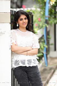 Viswa Sri Bandhavi in White Net Top and Black Jeans