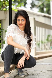 Viswa Sri Bandhavi in White Net Top and Black Jeans