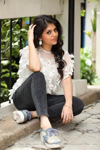 Viswa Sri Bandhavi in White Net Top and Black Jeans