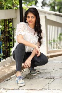 Viswa Sri Bandhavi in White Net Top and Black Jeans