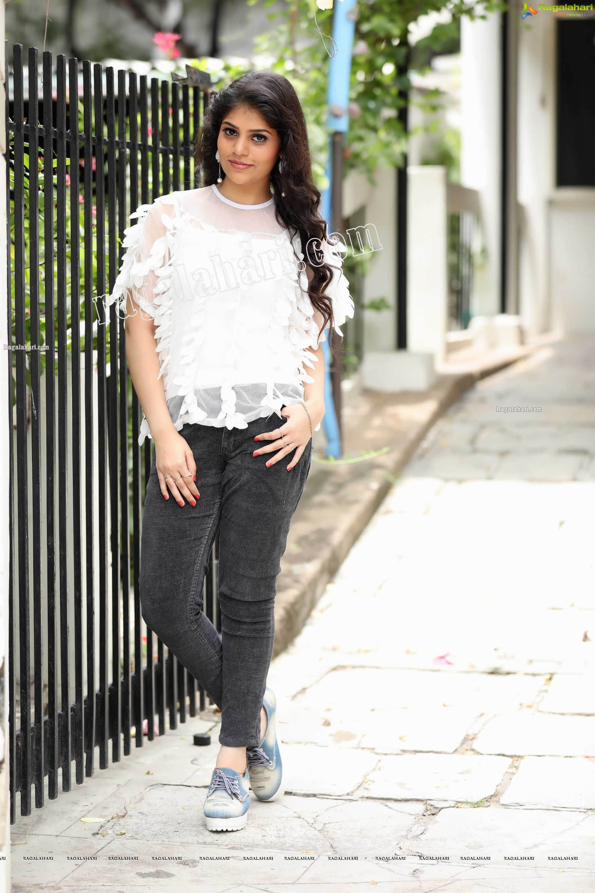 Viswa Sri Bandhavi in White Net Top and Black Jeans Exclusive Photo Shoot
