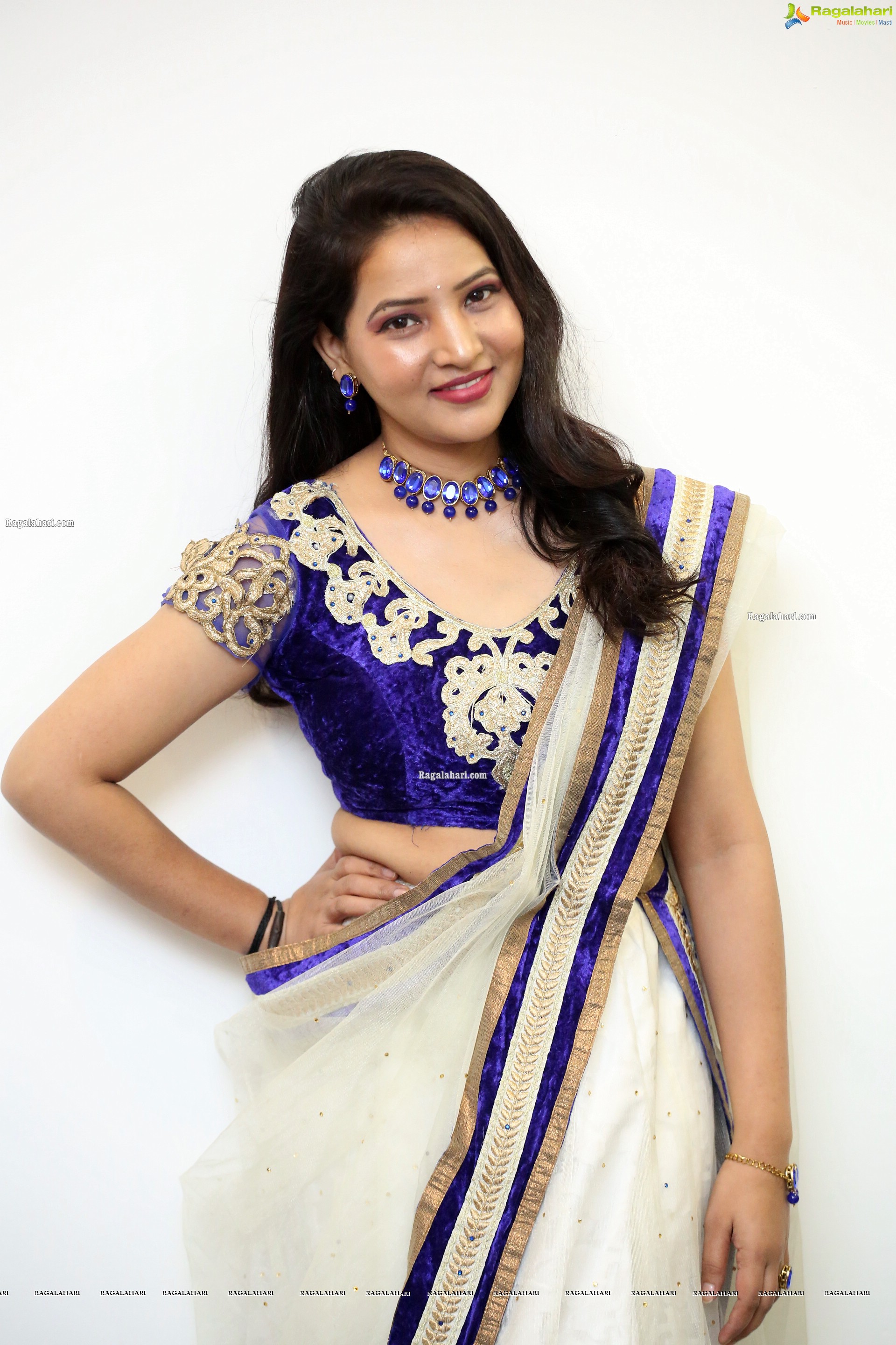 Anchor Vijayalakshmi in White Net Ornate Lehenga Choli, HD Photo Gallery