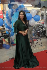 Chandni Bhagwanani in Bottle Green Dress