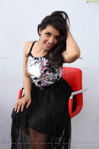 Neha Goswami in Black Sequin Embellished Skater Dress