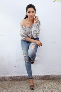 Neha Goswami in Ripped Jeans and fuzzy Sweatshirt