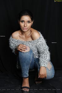 Neha Goswami in Ripped Jeans and fuzzy Sweatshirt