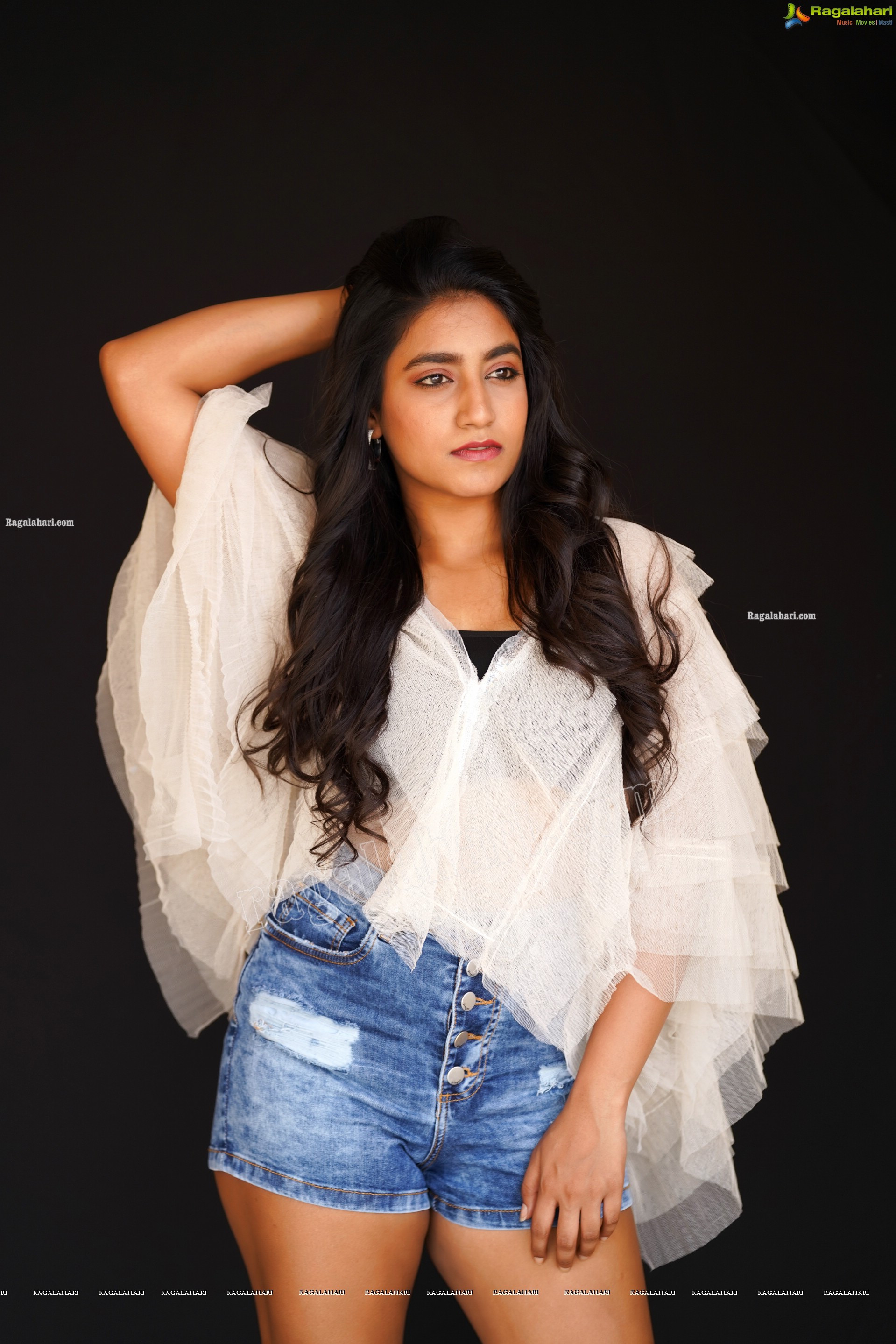 Yuktha in White Top And Denim Shorts, Exclusive Photoshoot