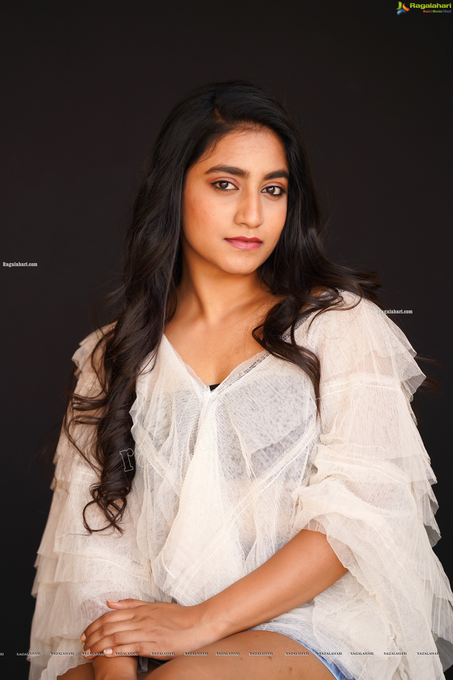 Yuktha in White Top And Denim Shorts, Exclusive Photoshoot
