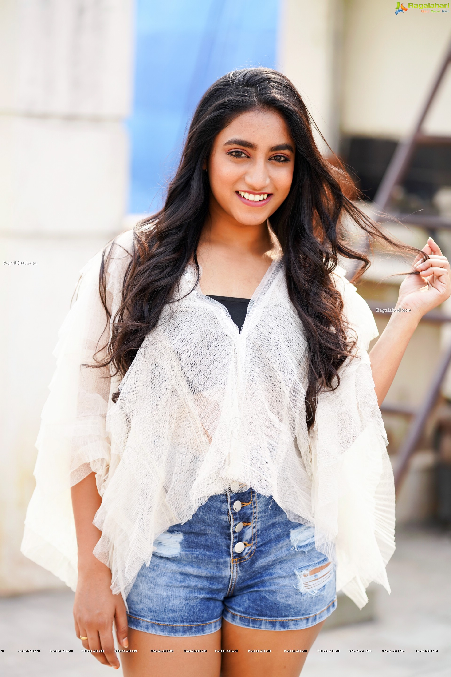 Yuktha in White Top And Denim Shorts, Exclusive Photoshoot