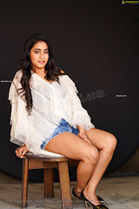 Yuktha in White Top And Denim Shorts