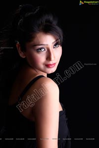 Amrita Ghosh in Mini Black Dress