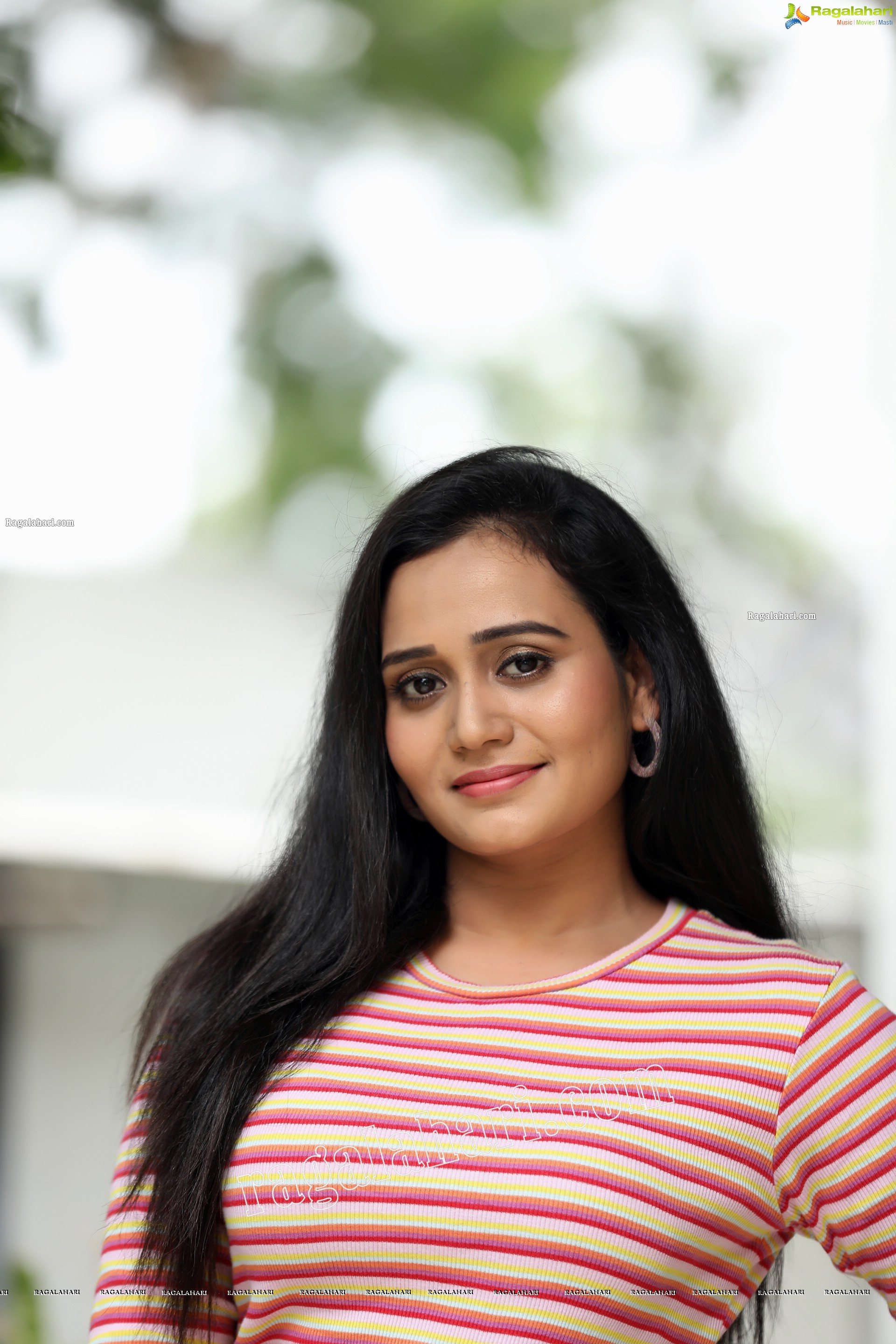 VJ Jaanu in Pink & Cream Striped T Shirt and Black Jeans Exclusive Photo Shoot