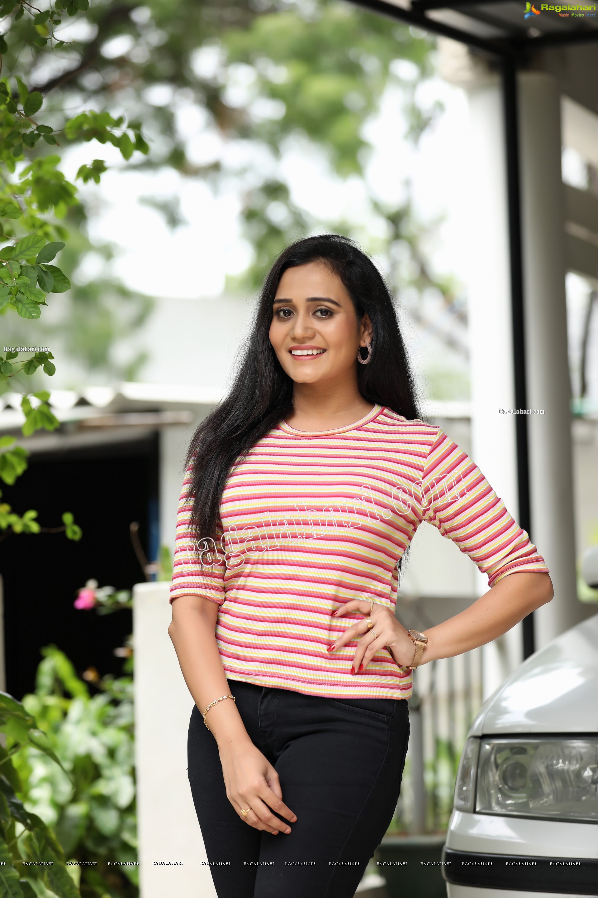 VJ Jaanu in Pink & Cream Striped T Shirt and Black Jeans Exclusive Photo Shoot