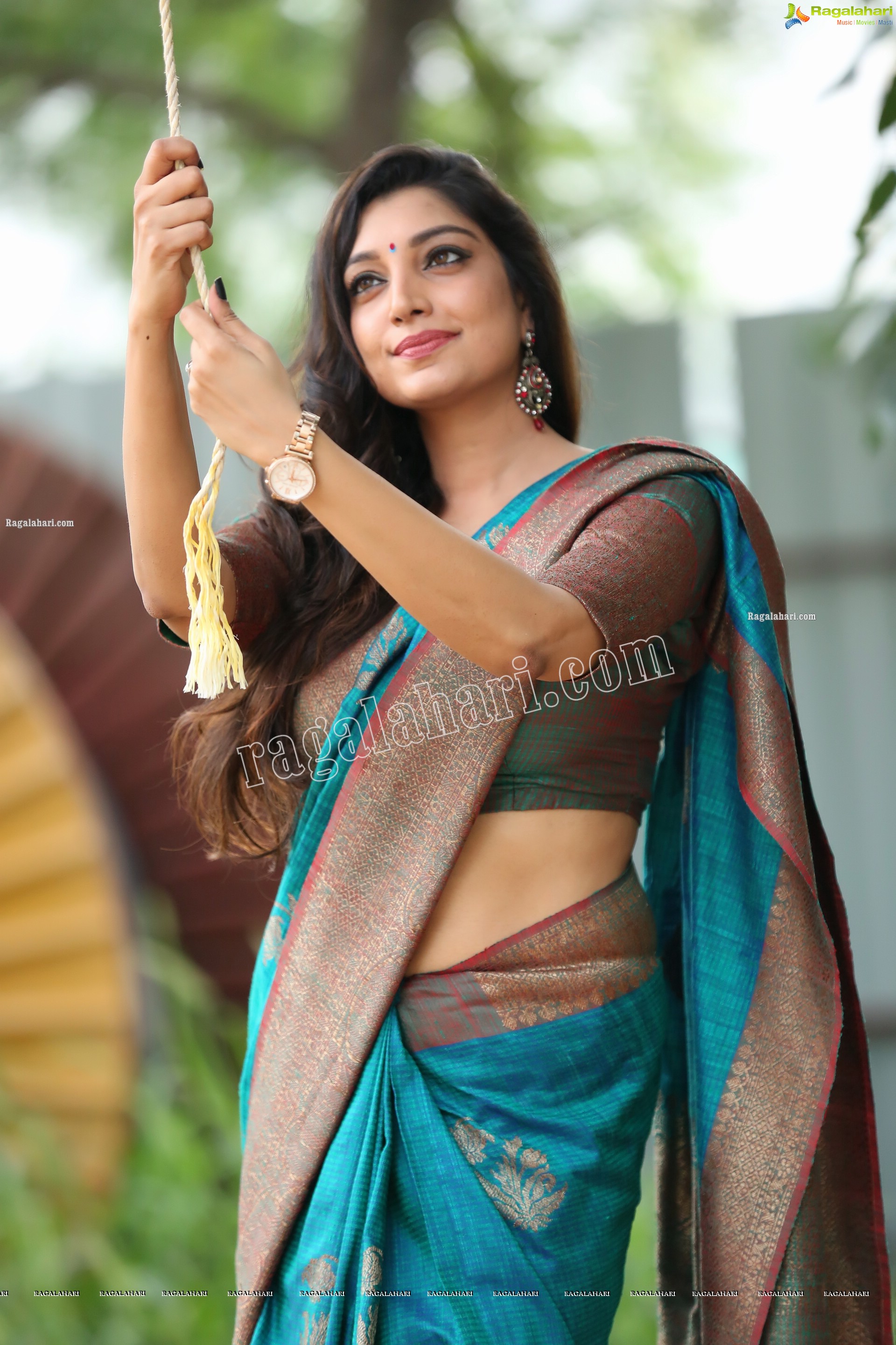 Rithu Manthra in Teal Blue Saree Exclusive Photo Shoot