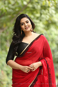 Sreemukhi in Red Saree