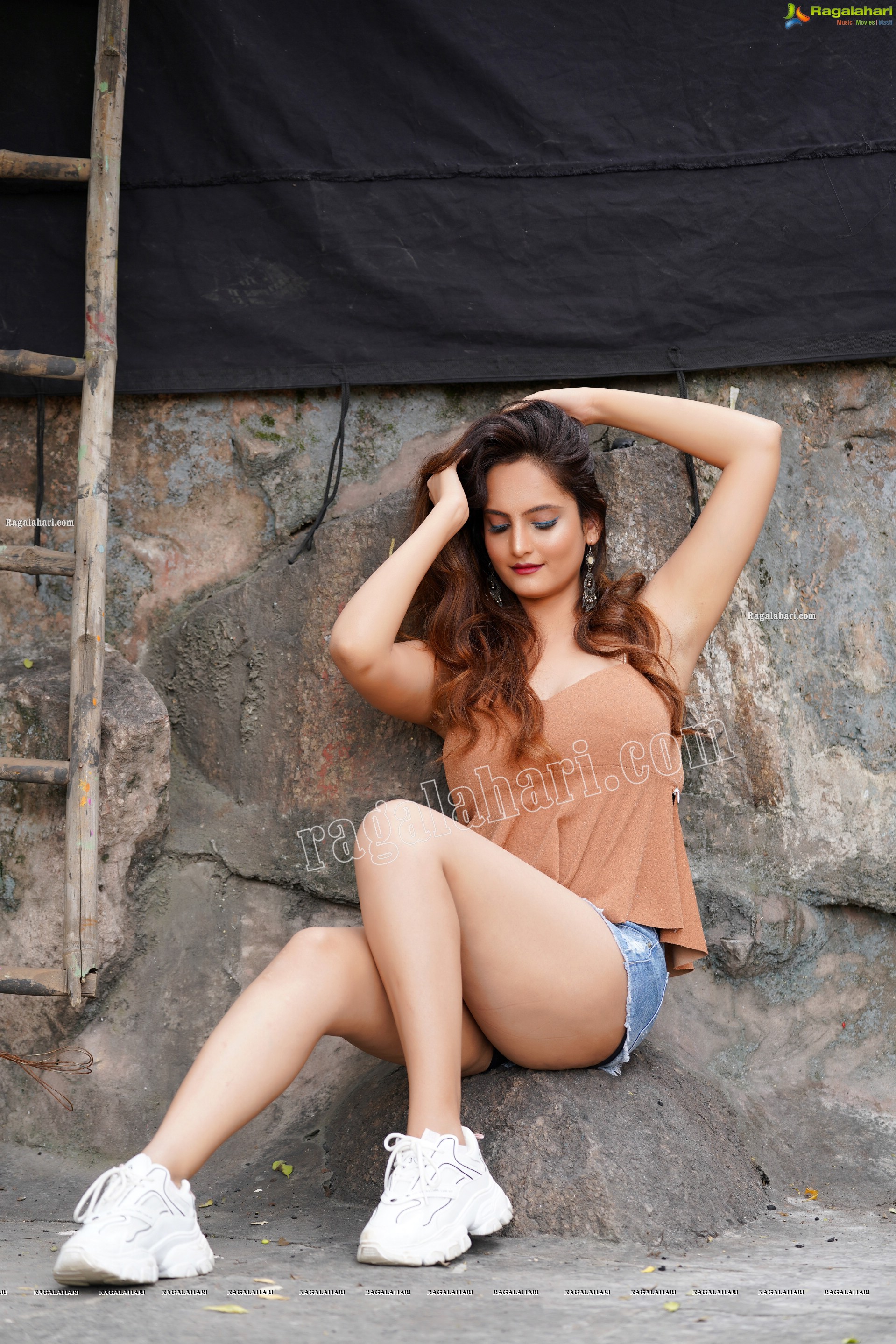 Dhriti Patel in Light Brown Peplum Top and Denim Shorts, Exclusive Photo Shoot