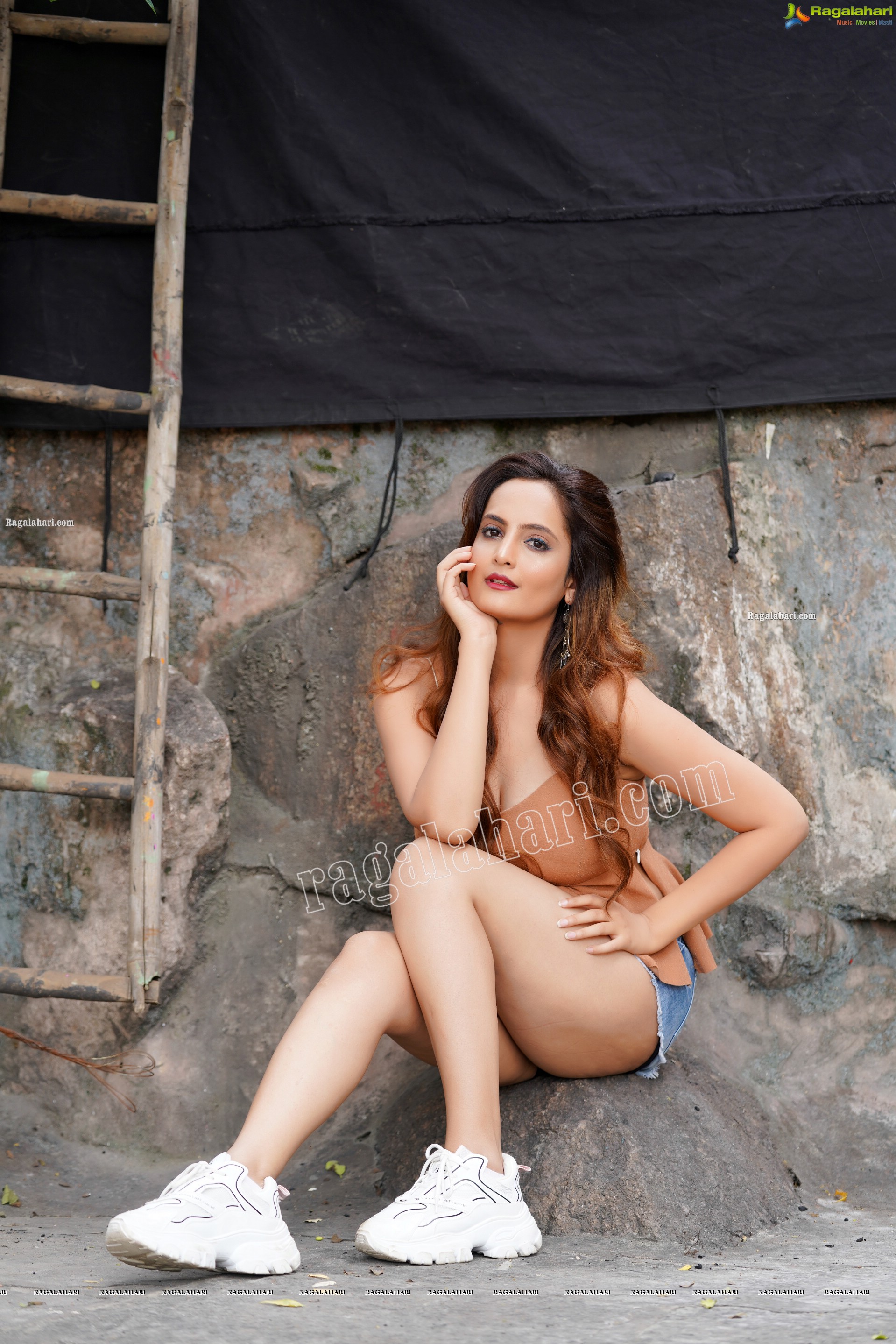 Dhriti Patel in Light Brown Peplum Top and Denim Shorts, Exclusive Photo Shoot