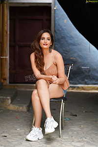 Dhriti Patel in Light Brown Peplum Top and Denim Shorts