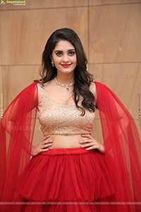 Surbhi Purnik in Red Lehenga Choli