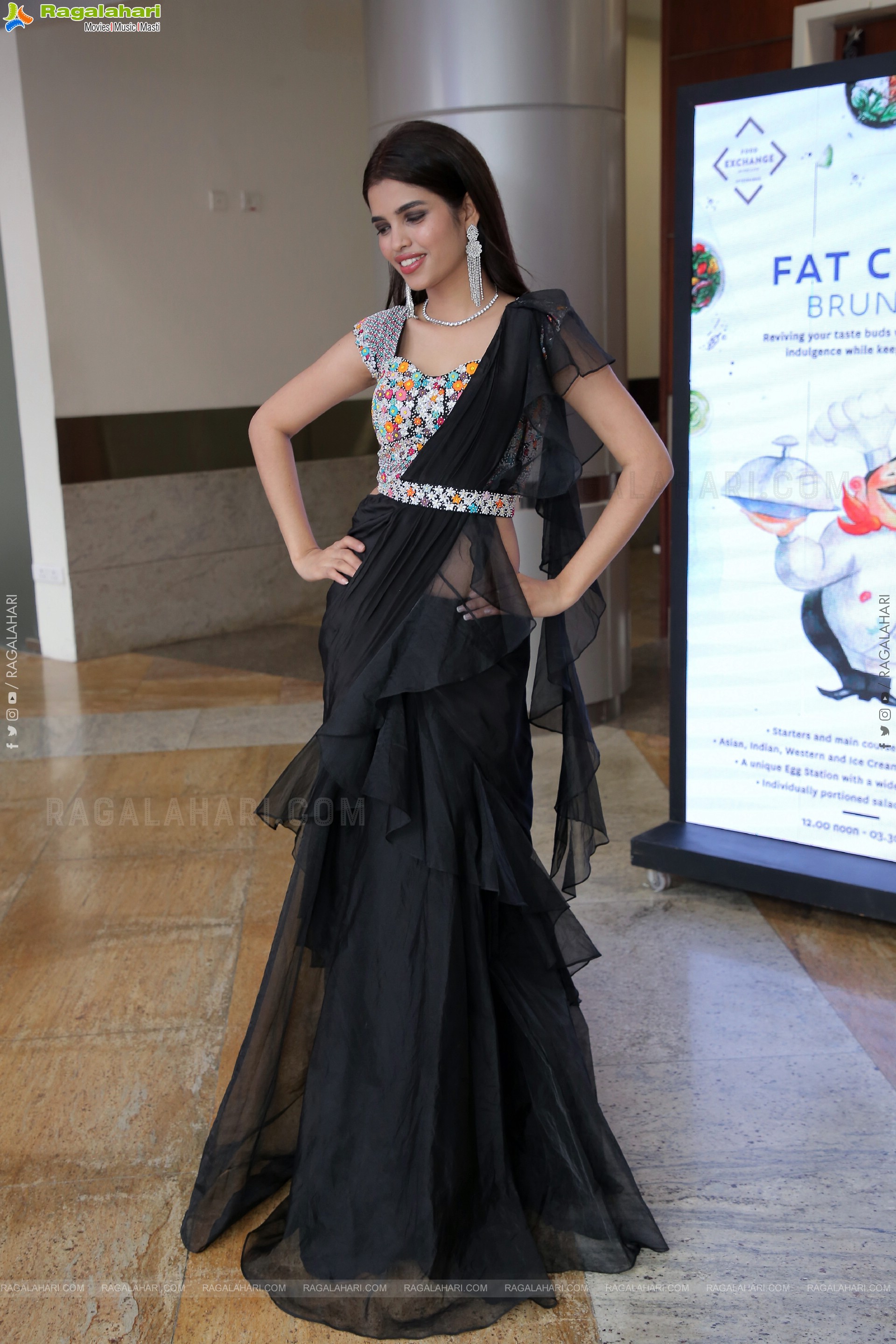 Urmila Chauhan in Black Ruffle Saree, HD Photo Gallery