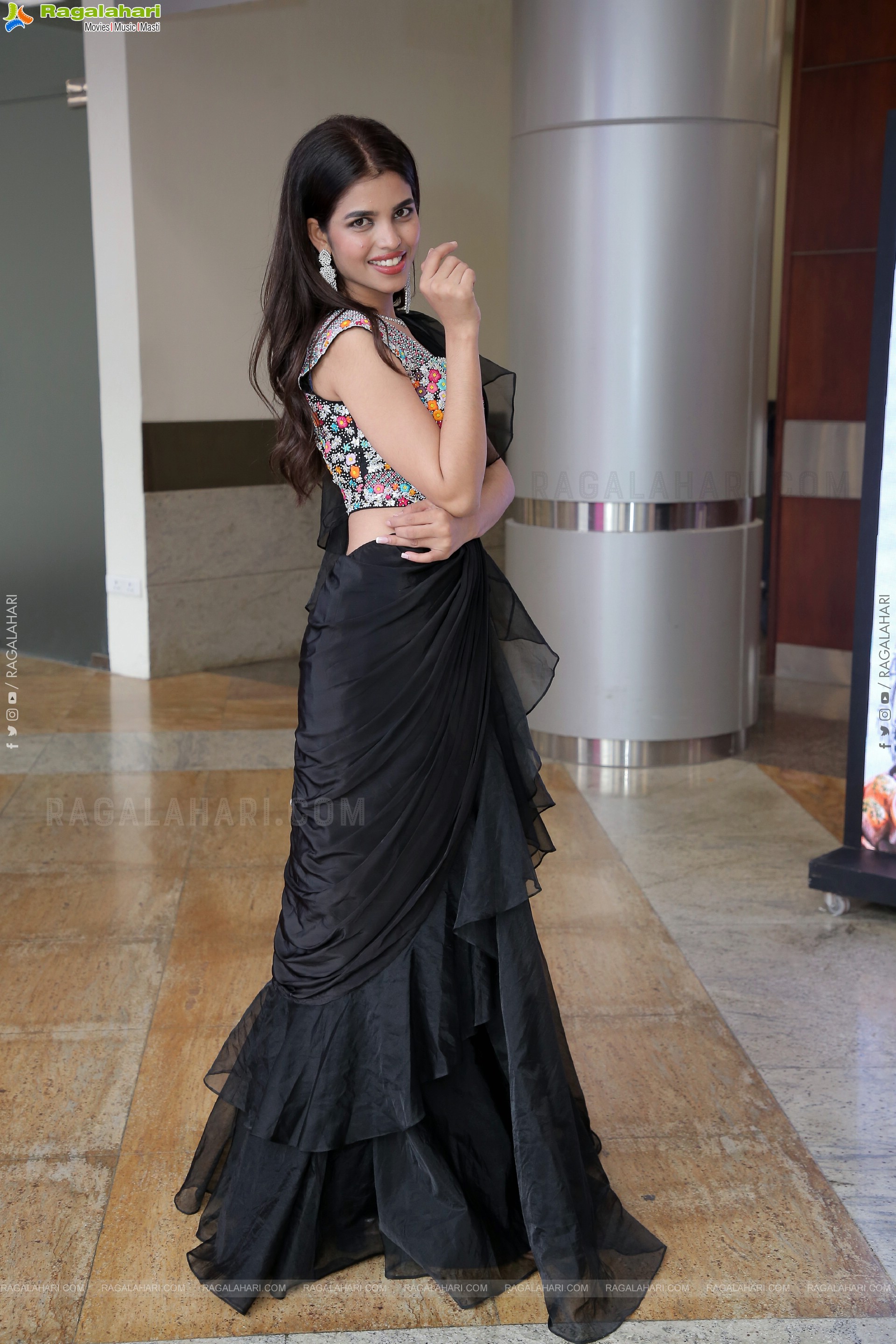 Urmila Chauhan in Black Ruffle Saree, HD Photo Gallery