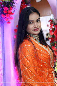 Manu Malleshwari stills in Orange Colour Designer Dress