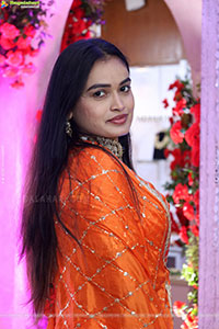 Manu Malleshwari stills in Orange Colour Designer Dress