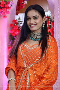 Manu Malleshwari stills in Orange Colour Designer Dress