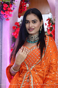 Manu Malleshwari stills in Orange Colour Designer Dress