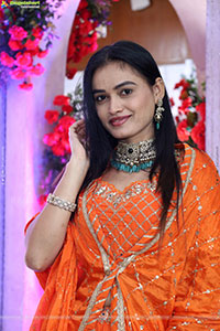 Manu Malleshwari stills in Orange Colour Designer Dress