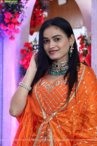 Manu Malleshwari stills in Orange Colour Designer Dress