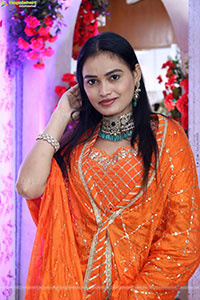 Manu Malleshwari stills in Orange Colour Designer Dress