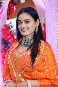 Manu Malleshwari stills in Orange Colour Designer Dress