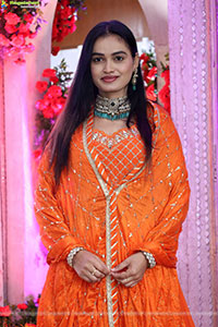 Manu Malleshwari stills in Orange Colour Designer Dress