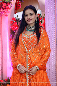 Manu Malleshwari stills in Orange Colour Designer Dress