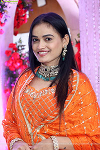 Manu Malleshwari stills in Orange Colour Designer Dress