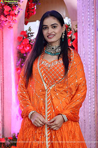Manu Malleshwari stills in Orange Colour Designer Dress