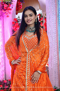 Manu Malleshwari stills in Orange Colour Designer Dress