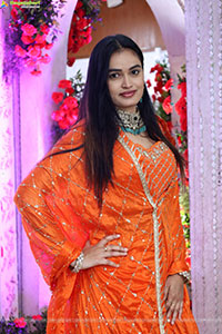 Manu Malleshwari stills in Orange Colour Designer Dress